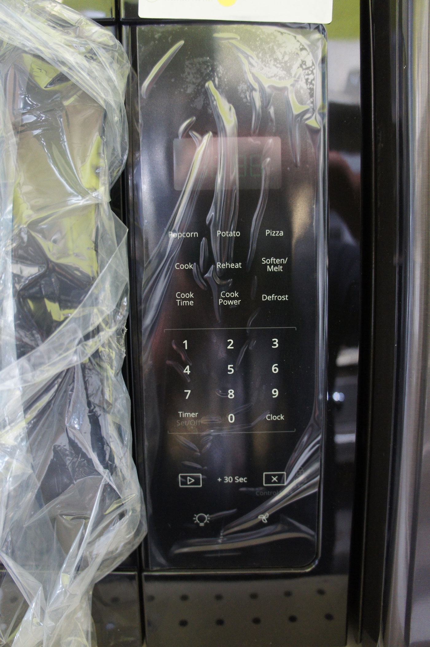 Whirlpool WMH31017HB 1.7 cu. ft. OTR Microwave Oven - Image 4